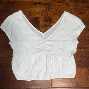 Hollister V White Top. Fits like a large